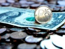Рубль растет, несмотря на снижение цен на нефть